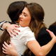 Rachael Denhollander, left, hugs Sterling Riethman after Larry Nassar’s plea hearing in Lansing, Mich in Nov. 2017
